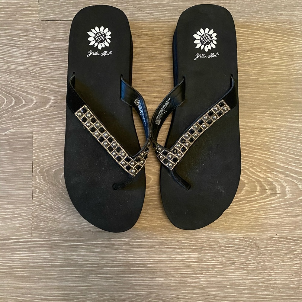 Yellow box flip flops